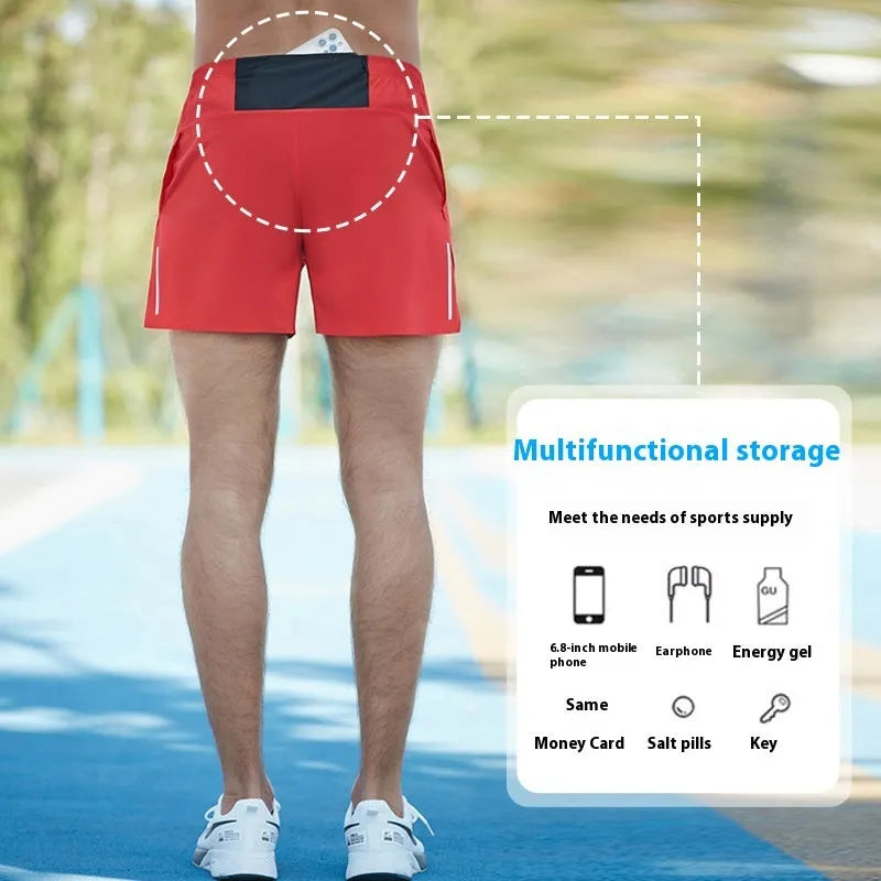 Men's black loose-fit off-road running shorts with a high waist, made from quick-dry fabric.