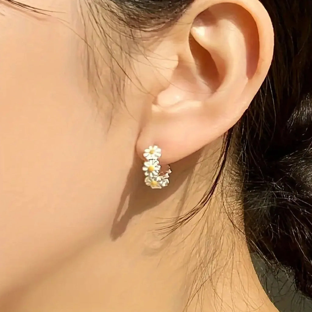 White daisy flower ring earrings with electroplated copper construction and platinum inlaid gem detailing