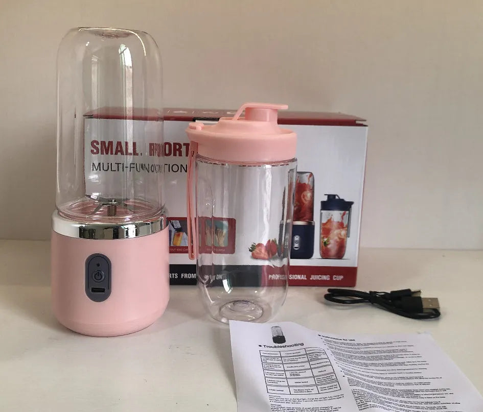 Tunisian dark blue portable blender and juicer with six blades, USB cable, and 400ml cup.