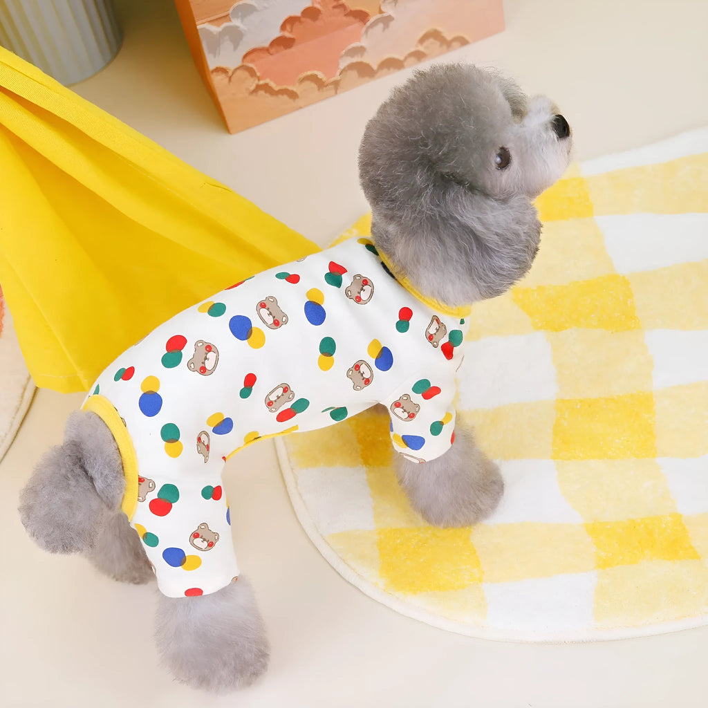 Beige dog costume with colourful ball bear design, made from cotton and spandex blend.