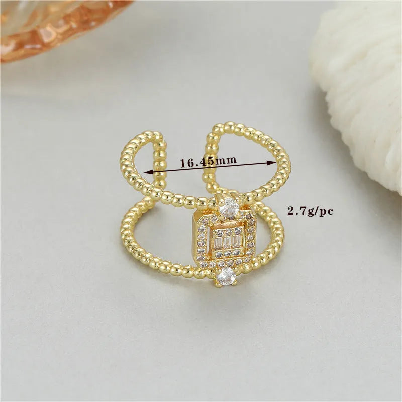 Adjustable copper gold-plated open ring with asymmetric U-shape in H-12813 colour