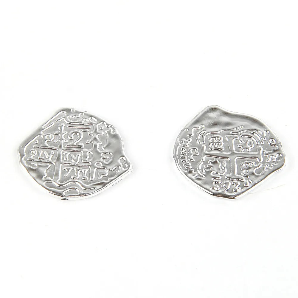 Doli set of 100 gold, silver, or bronze plastic replica Roman coins for decoration and crafts.