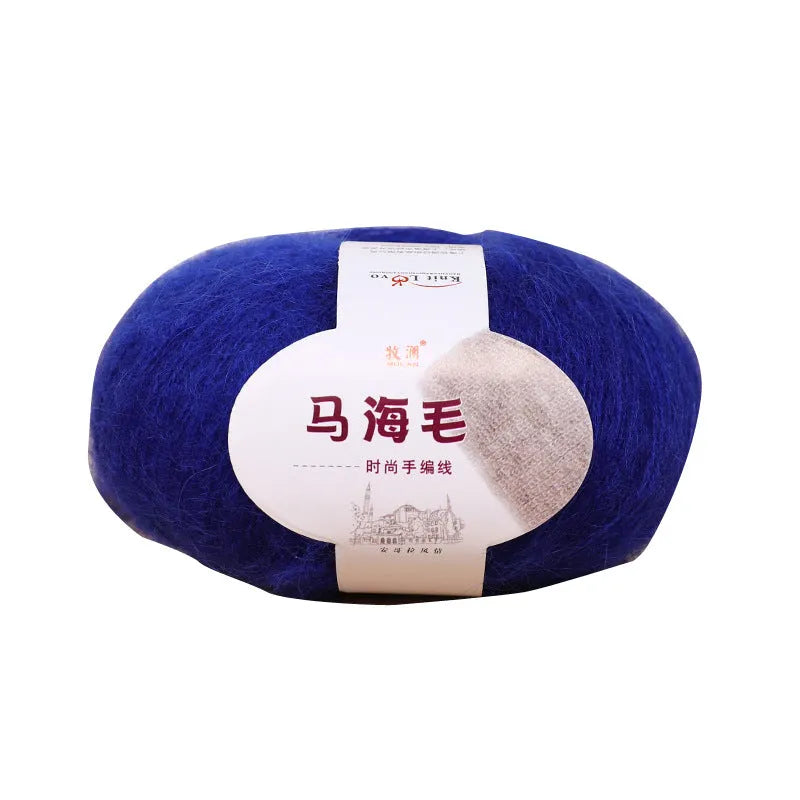 Ball of mohair yarn with Inverness thread for DIY scarf knitting kit in various colours.