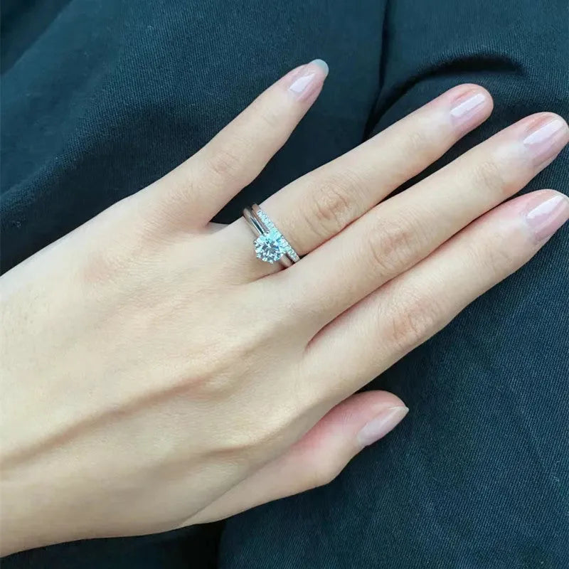 Adjustable heart-shaped moissanite couple ring with dragon, phoenix, and ten thousand words decorations on a silver-plated band.