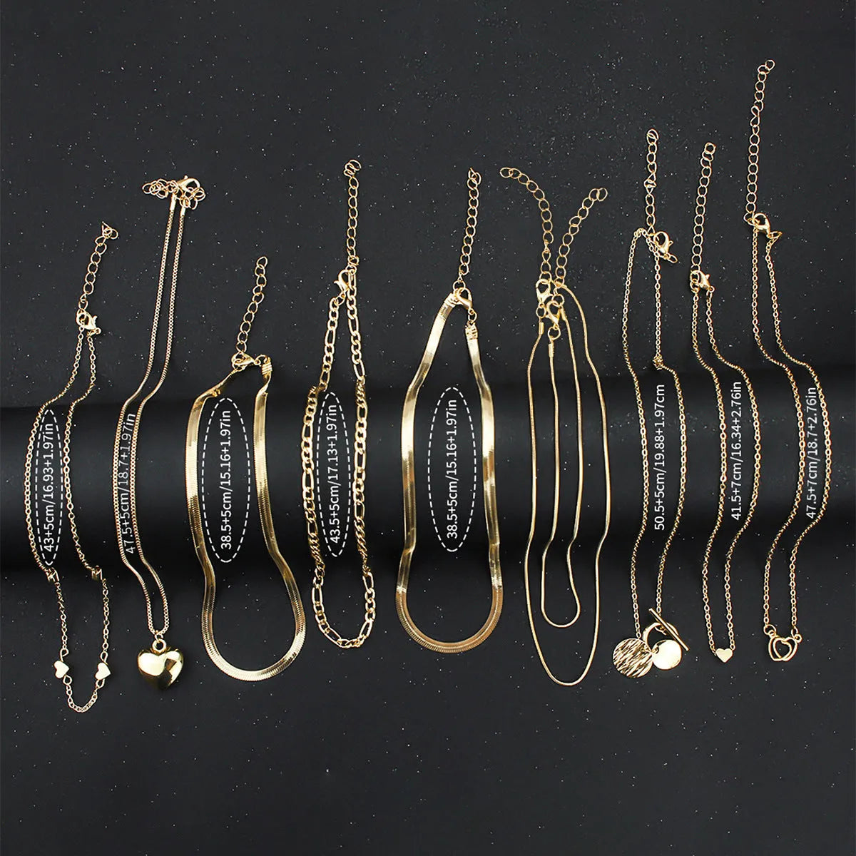 Gold women's necklace set with 10 alloy pendants on adjustable snake bone chain