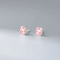 S925 sterling silver cherry blossom square stud earrings on a white background, showing polished silver finish and floral geometric design.