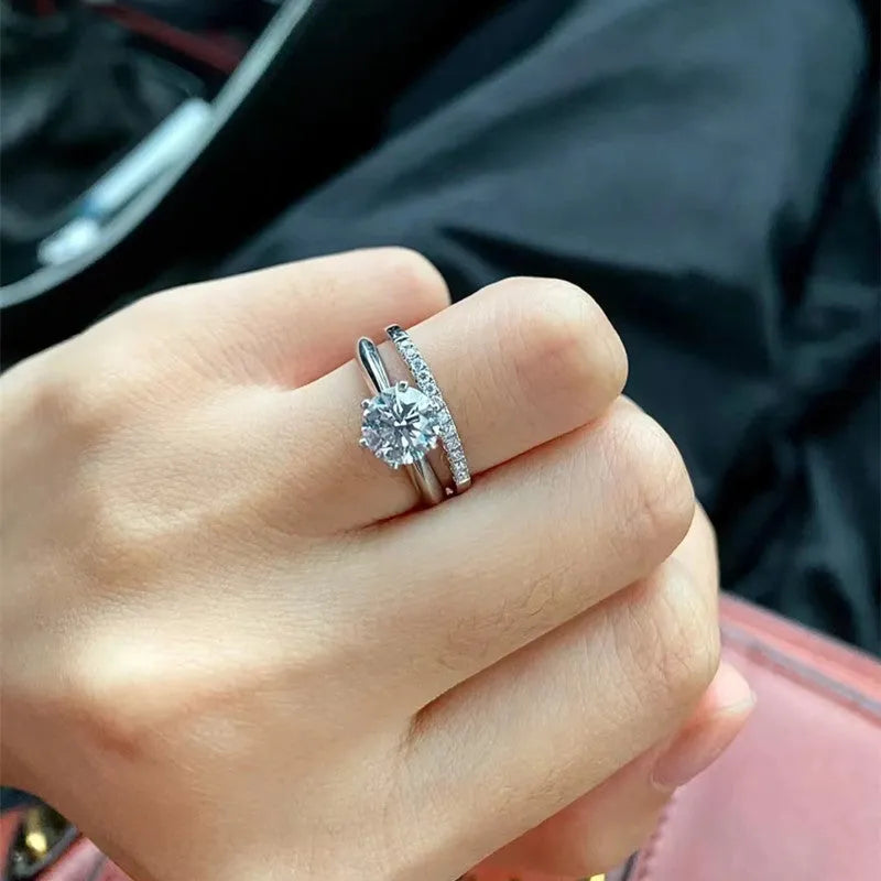 Adjustable heart-shaped moissanite couple ring with dragon, phoenix, and ten thousand words decorations on a silver-plated band.