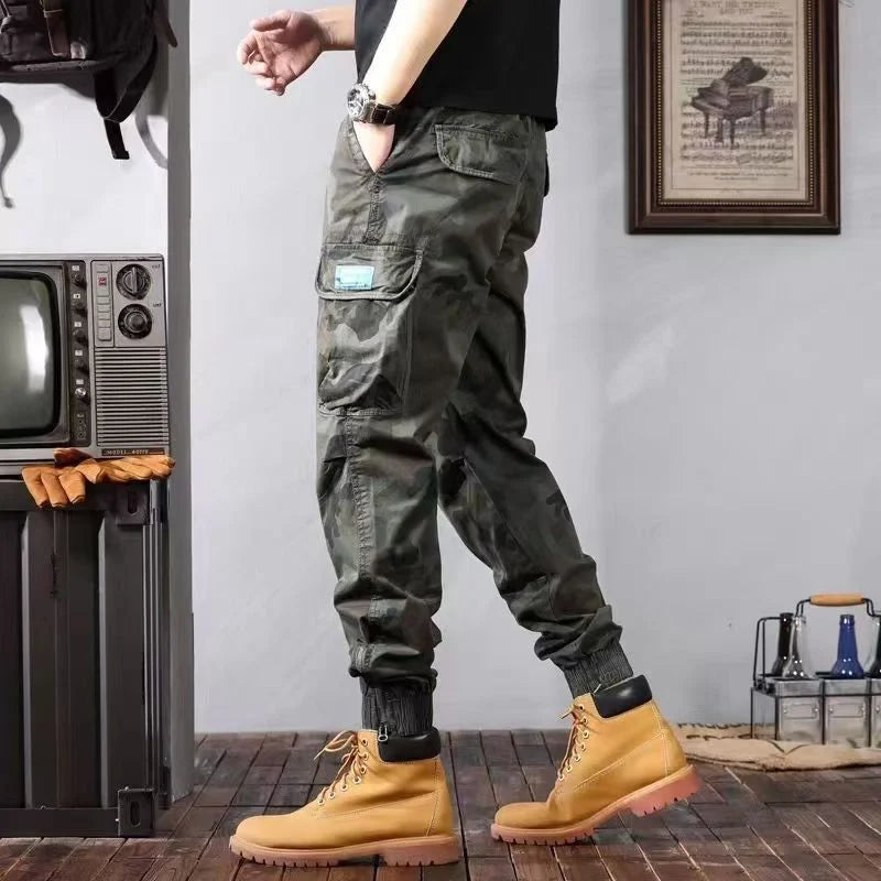 Men's camouflage cargo pants with multiple pockets and loose tapered fit