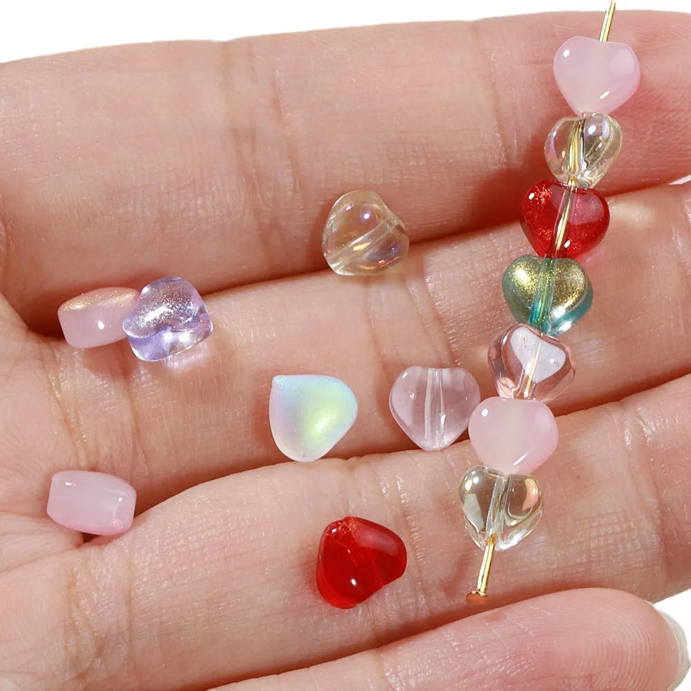 20 transparent Czech glass spacer beads with love pattern in aurora colours for DIY jewellery making