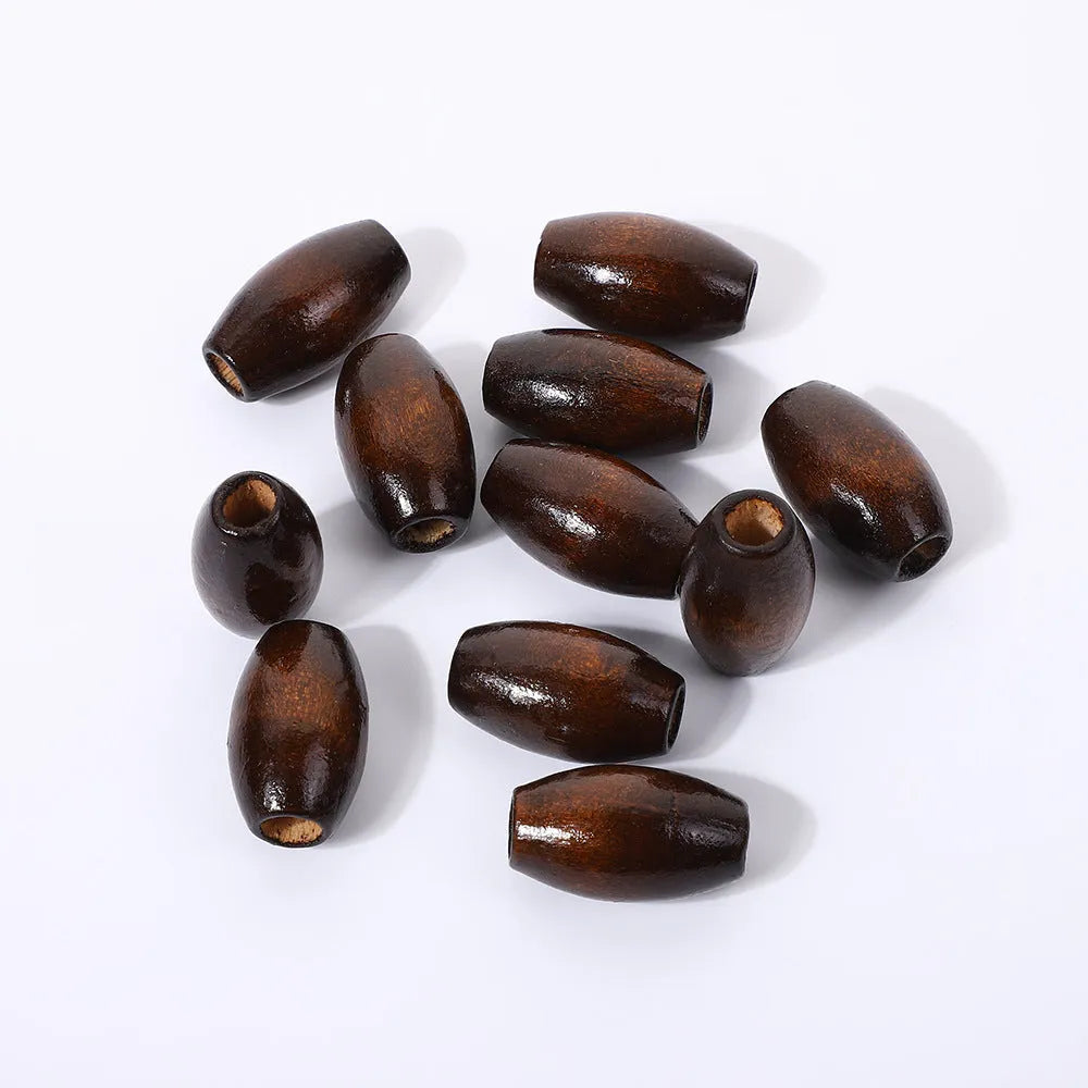 Oval wooden bead with M-shaped raised texture in dark coffee colour, showing 25mm dimensions