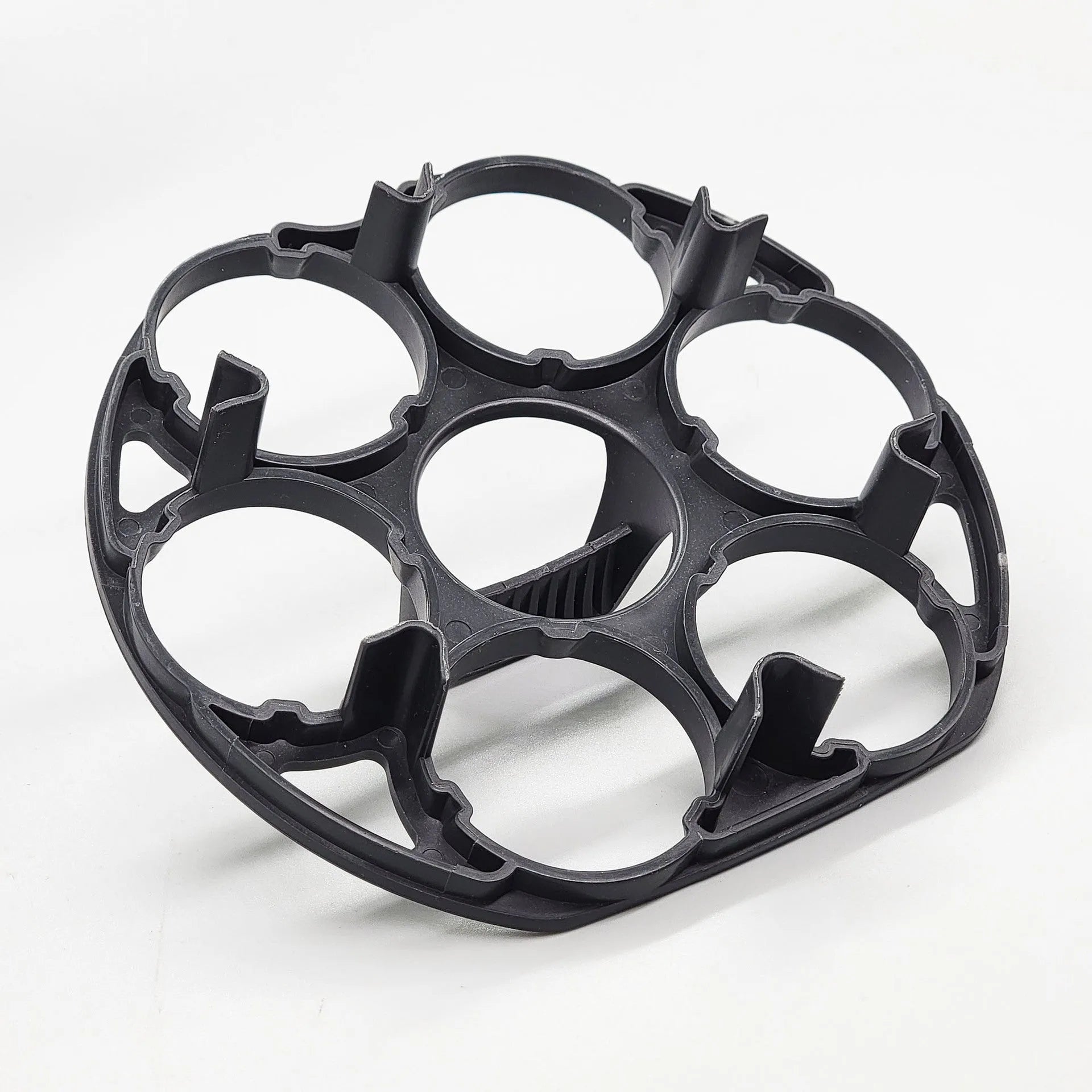 Black plastic egg holder with modern design measuring 13.8 by 12.6 by 5.7 centimetres