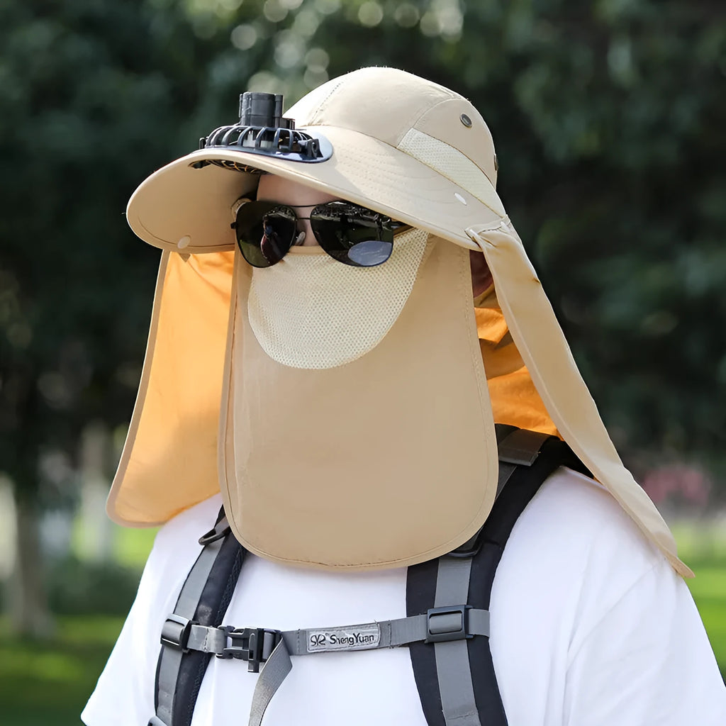 Man wearing a khaki sun hat with a built-in USB-rechargeable fan for face and neck protection.