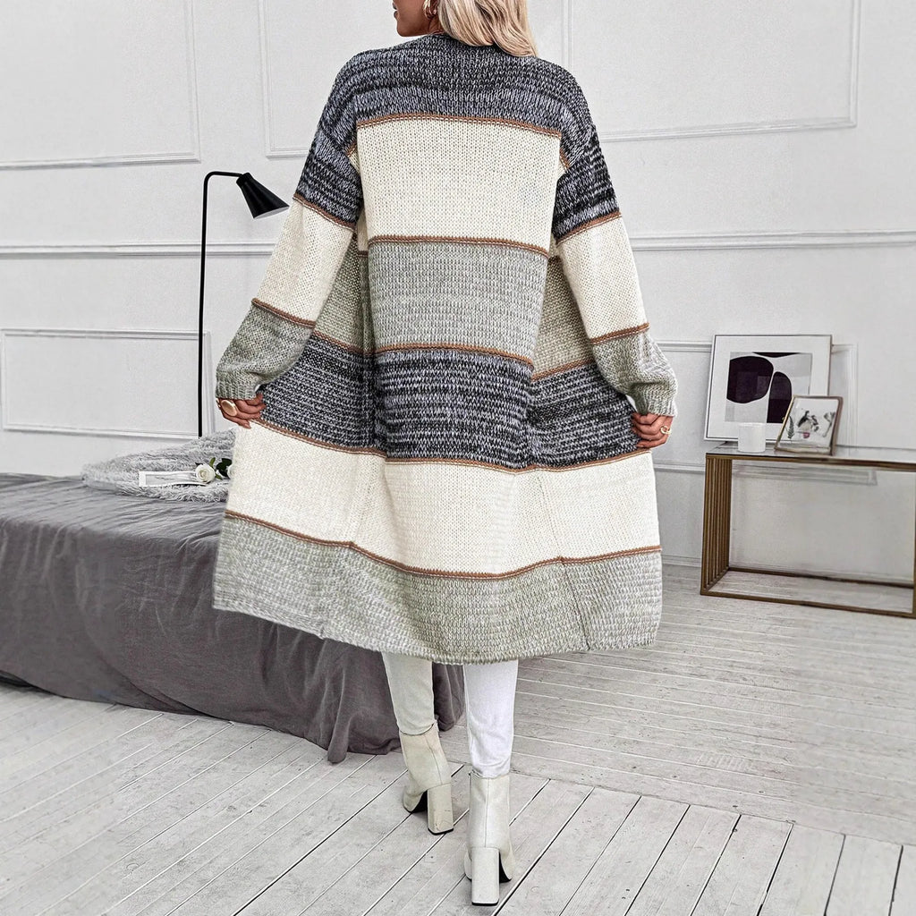 Grey women's loose-fit knitted cardigan with long sleeves in a striped pattern.