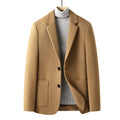 Men's slim fit wool suit jacket in grey shown on a hanger.