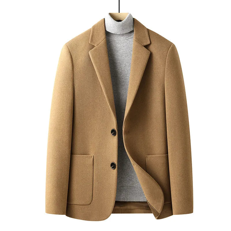 Men's slim fit wool suit jacket in grey shown on a hanger.