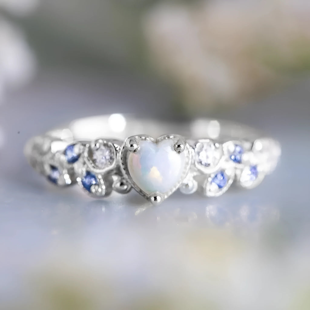Peach-coloured women's heart-shaped alloy ring with a detailed flower opal ocean design.