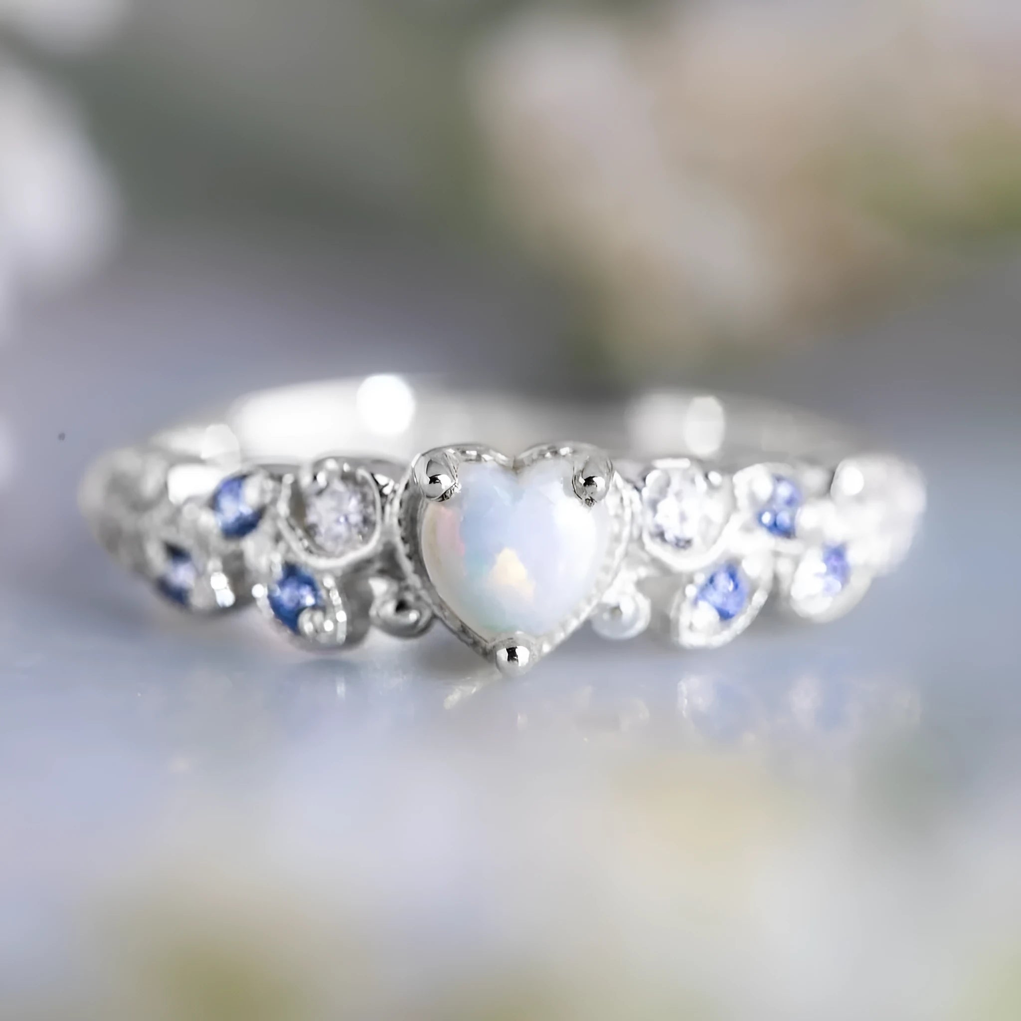 Peach-coloured women's heart-shaped alloy ring with a detailed flower opal ocean design.