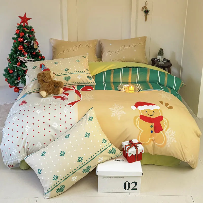 Christmas cartoon printed four-piece bedding set with quilt cover, sheet, and pillowcases on a bed.