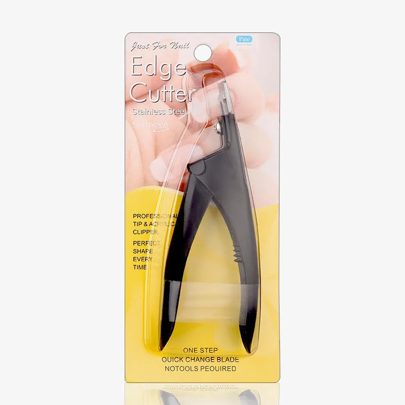 Close-up of stainless steel French U-shaped nail scissors on a plain background.