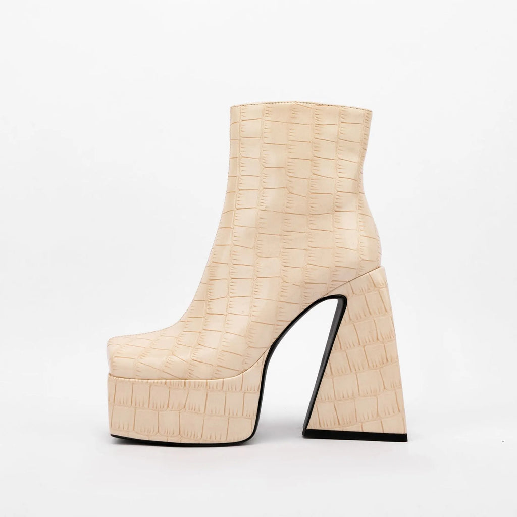 Women's ankle boot in artificial PU with a super high heel, shown in a solid colour.