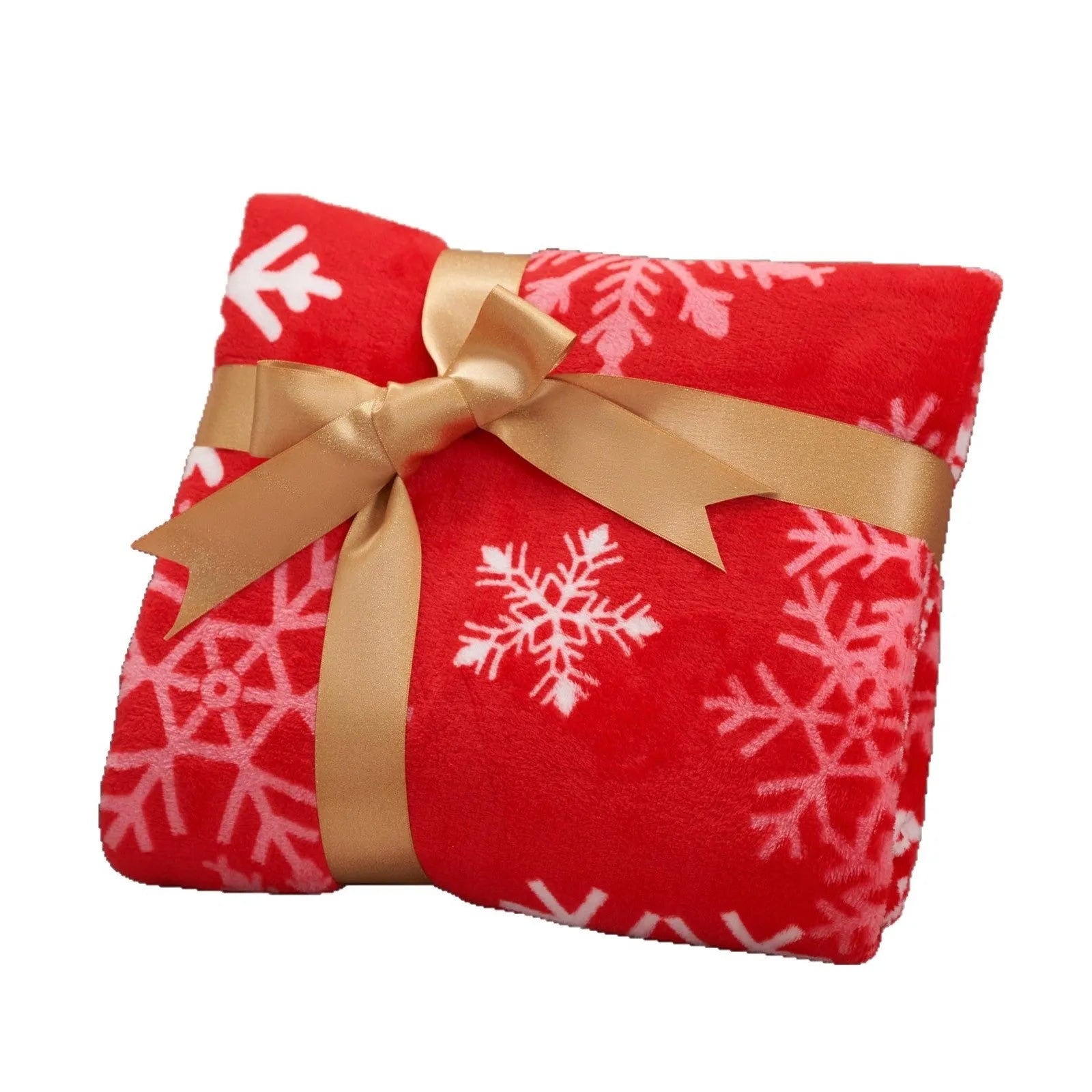 Reversible soft flannel Christmas blanket in a selection of colours and sizes on a sofa.