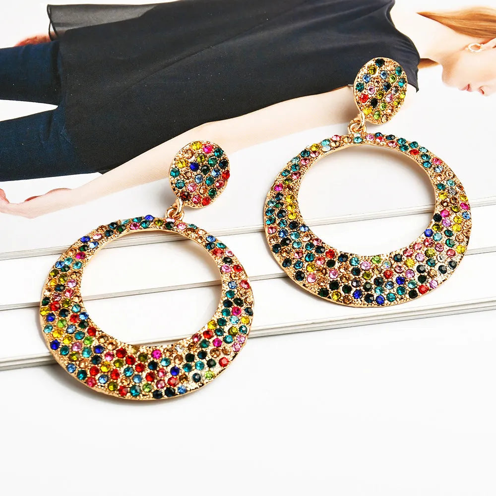 Colourful cartoon-style metal pendant earrings with a large round base and diamond shape for women.
