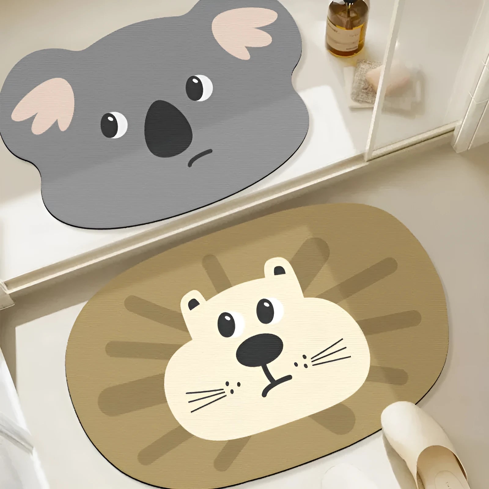 Thickened diatom oil bathroom mat with cartoon animal design in alien shape for shower area water absorption.