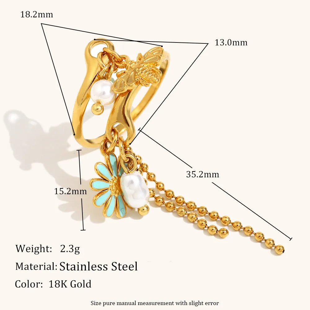 Tassel open ring in stainless steel with 18K gold plating featuring bee and daisy design