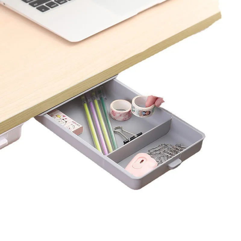 White plastic adhesive under-table storage drawer with covered lid and internal grid compartments