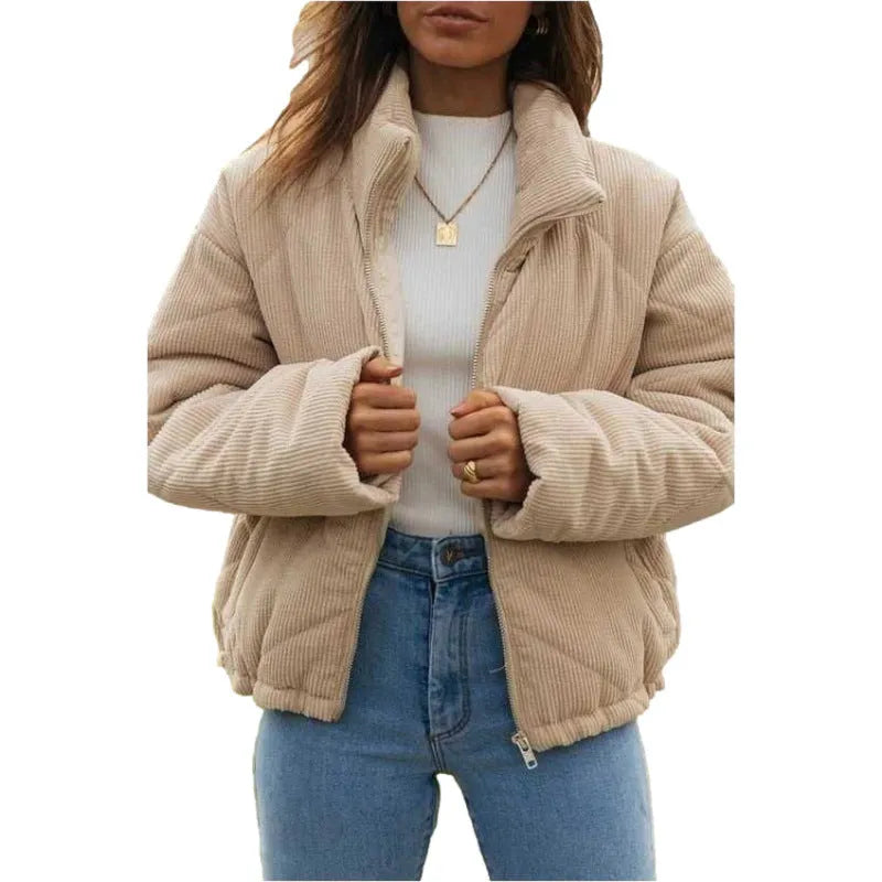 Apricot coloured women's corduroy jacket with a stand collar, front zipper, and long sleeves.
