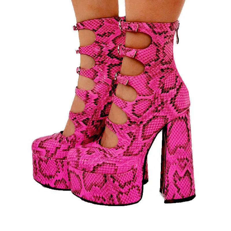 Black patent leather women's platform high heels with a thick heel and a serpentine belt ankle buckle.