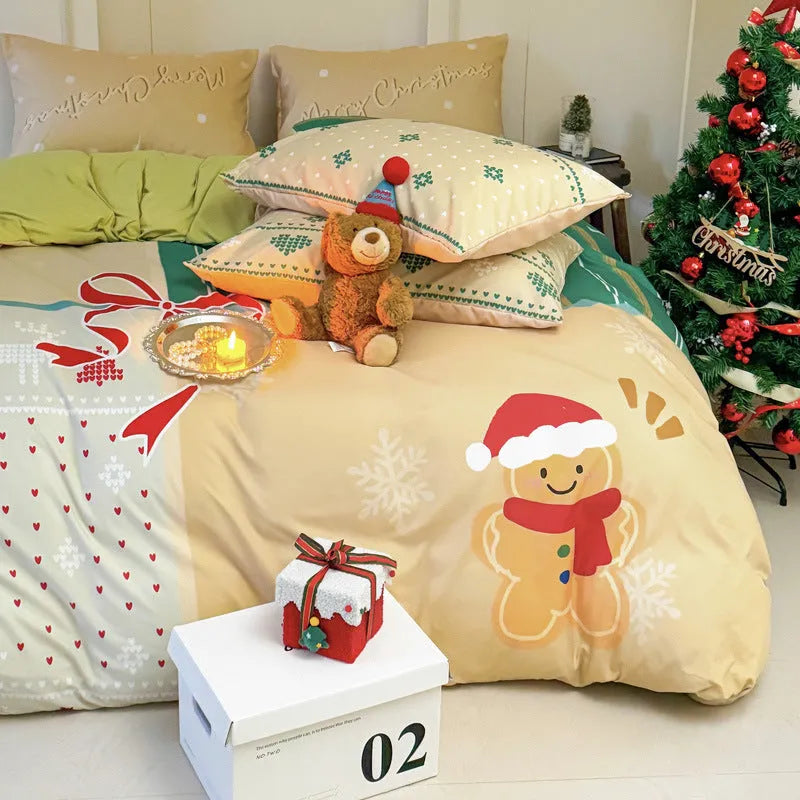 Christmas cartoon printed four-piece bedding set with quilt cover, sheet, and pillowcases on a bed.