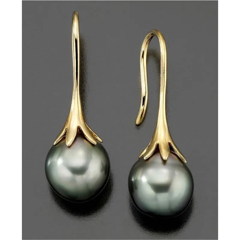 Gold retro fashion women's earrings with personalised creative design and alloy construction