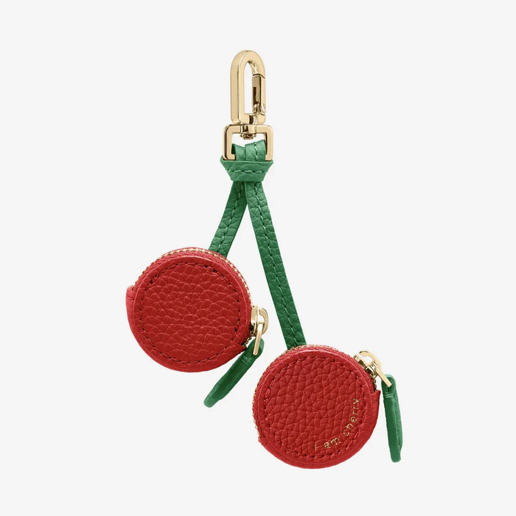 PU leather mini coin bag on a keychain in cherry, blueberry, or orange colour