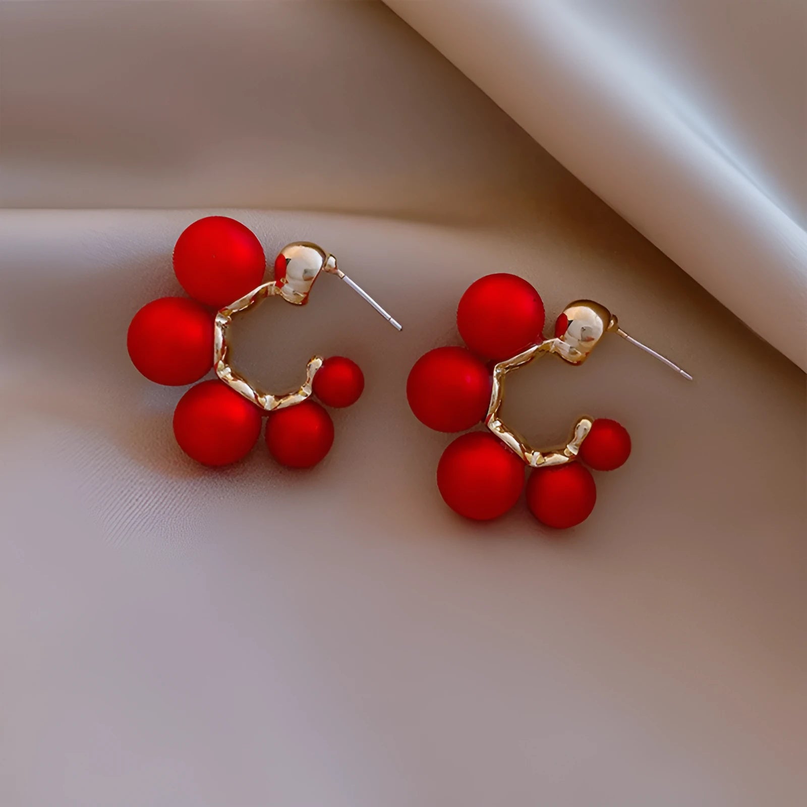 Women's red bell-shaped alloy earrings with drop pendant design