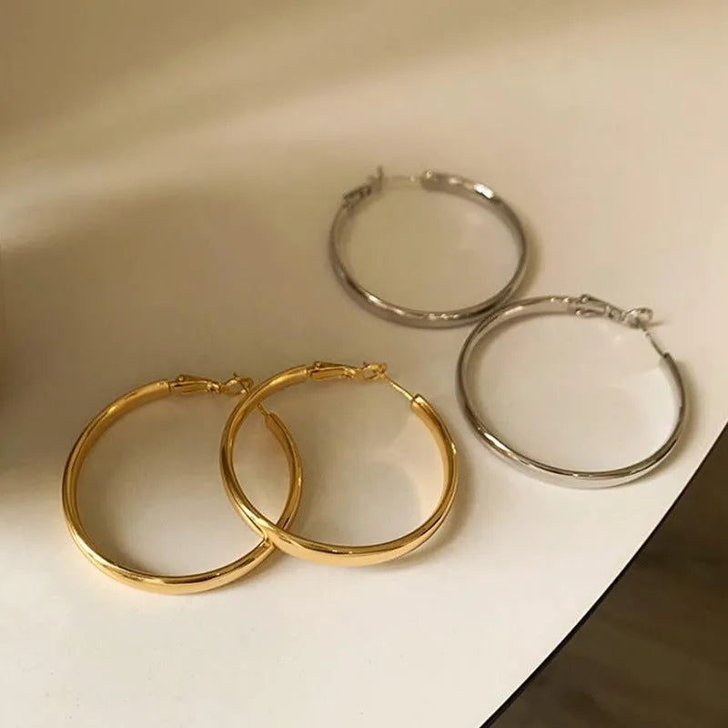 40mm circular hoop earrings in electroplated gold or silver finish