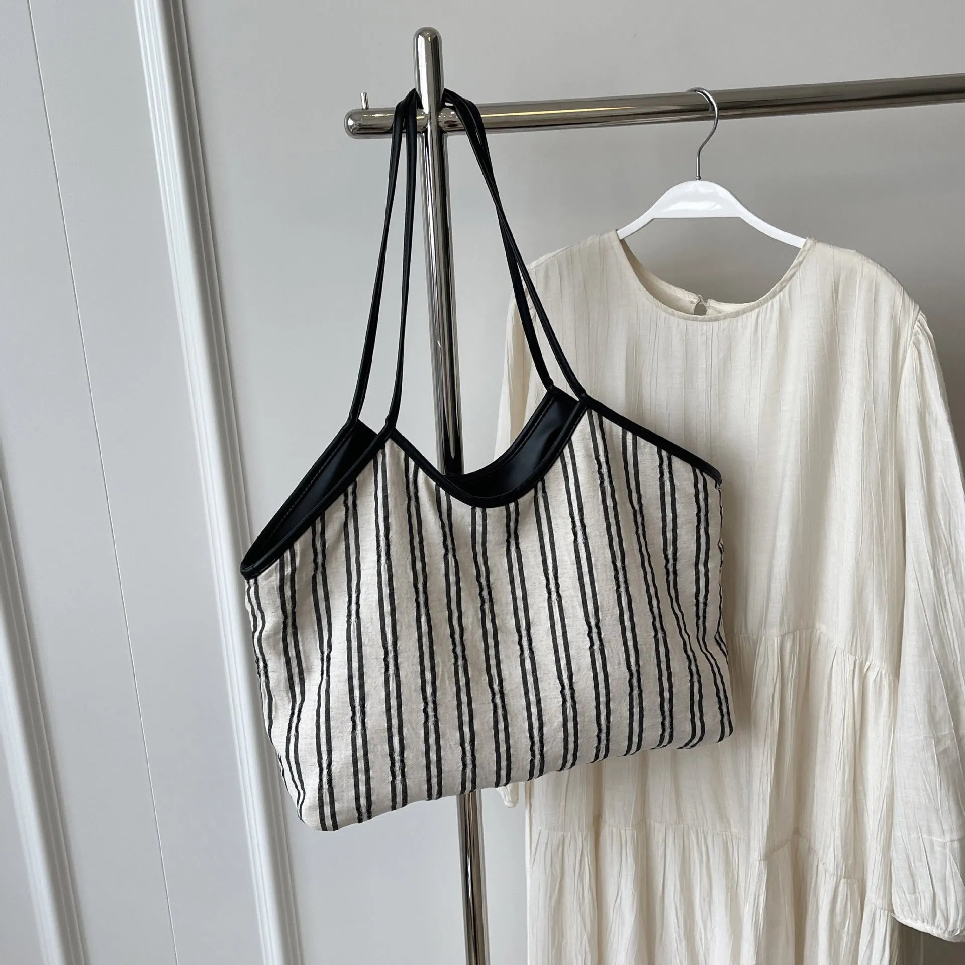 Striped cloth Korean style bucket shoulder messenger bag with beige ribbon scarf and woven belt detailing, soft horizontal square shape