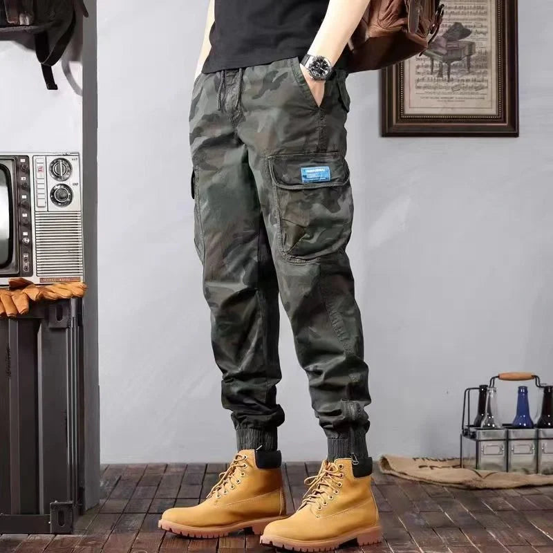 Men's camouflage cargo pants with multiple pockets and loose tapered fit