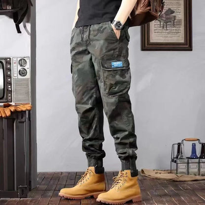 Men's camouflage cargo pants with multiple pockets and loose tapered fit