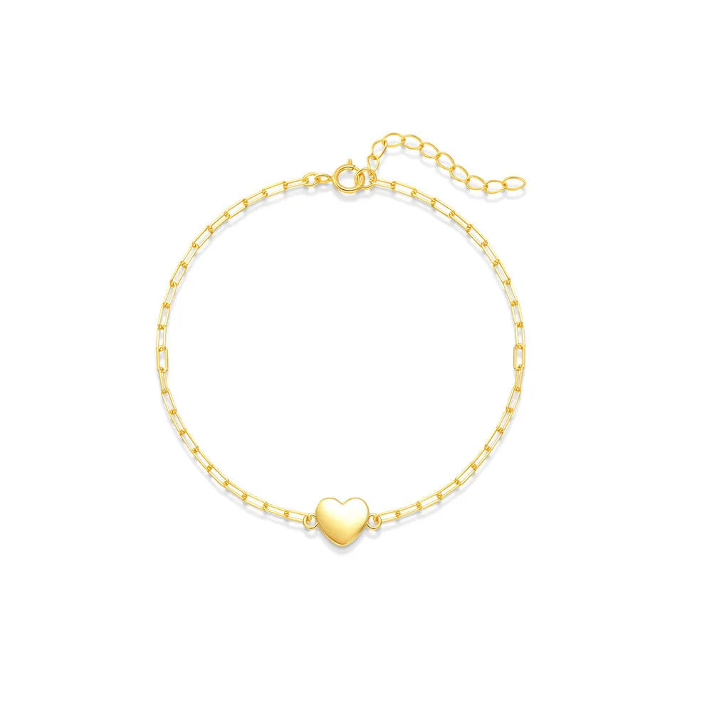 Gold-colour sterling silver bracelet with heart charm and clip chain fastening