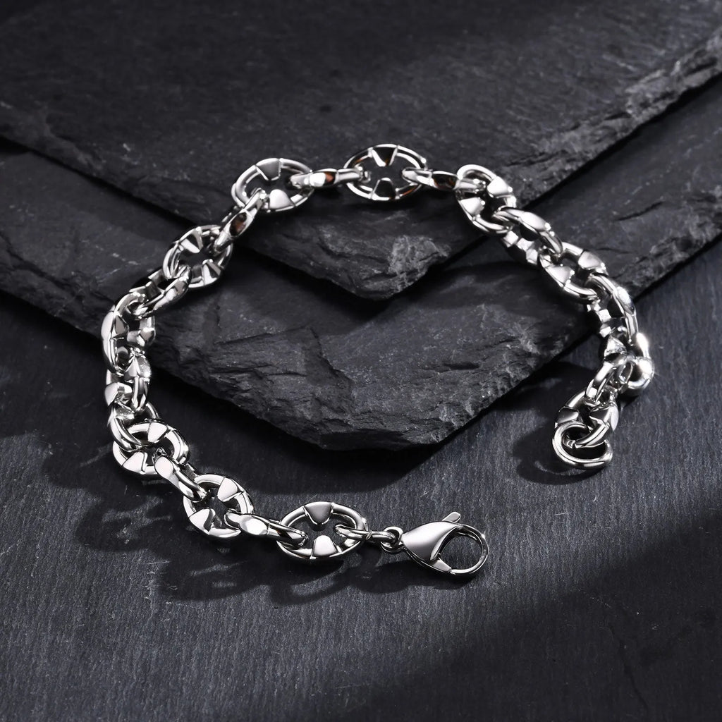 Thick geometric stainless steel chain bracelet in steel colour for men's hip hop fashion.