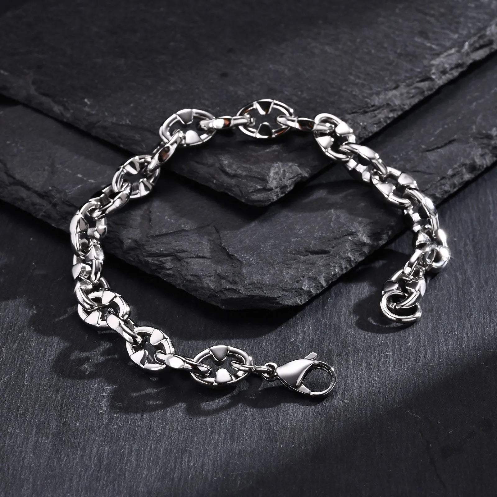 Thick geometric stainless steel chain bracelet in steel colour for men's hip hop fashion.