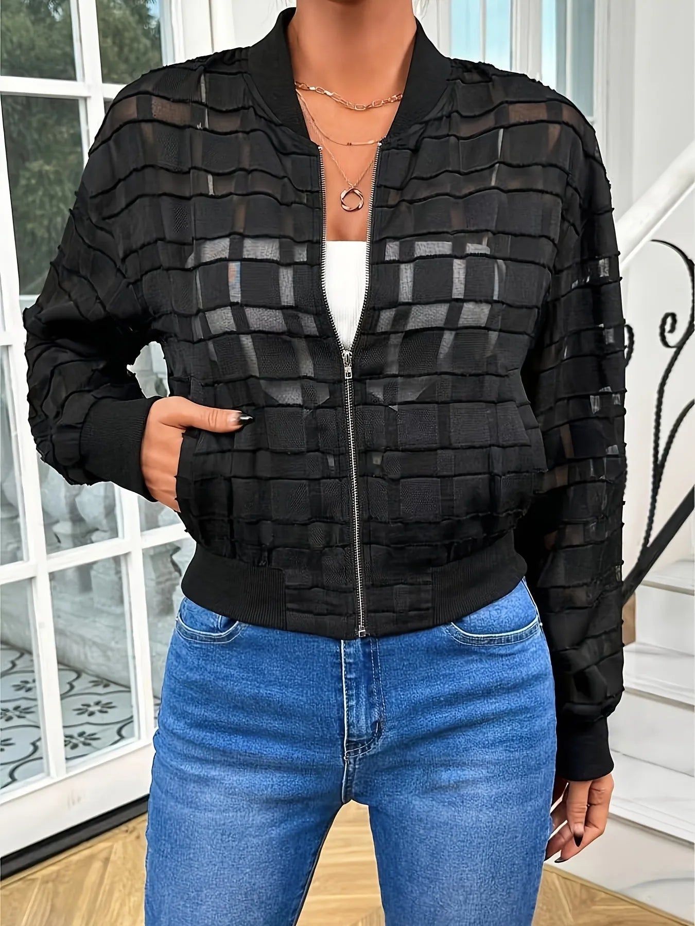 Black semi-transparent women's casual jacket with geometric pattern and front zipper closure
