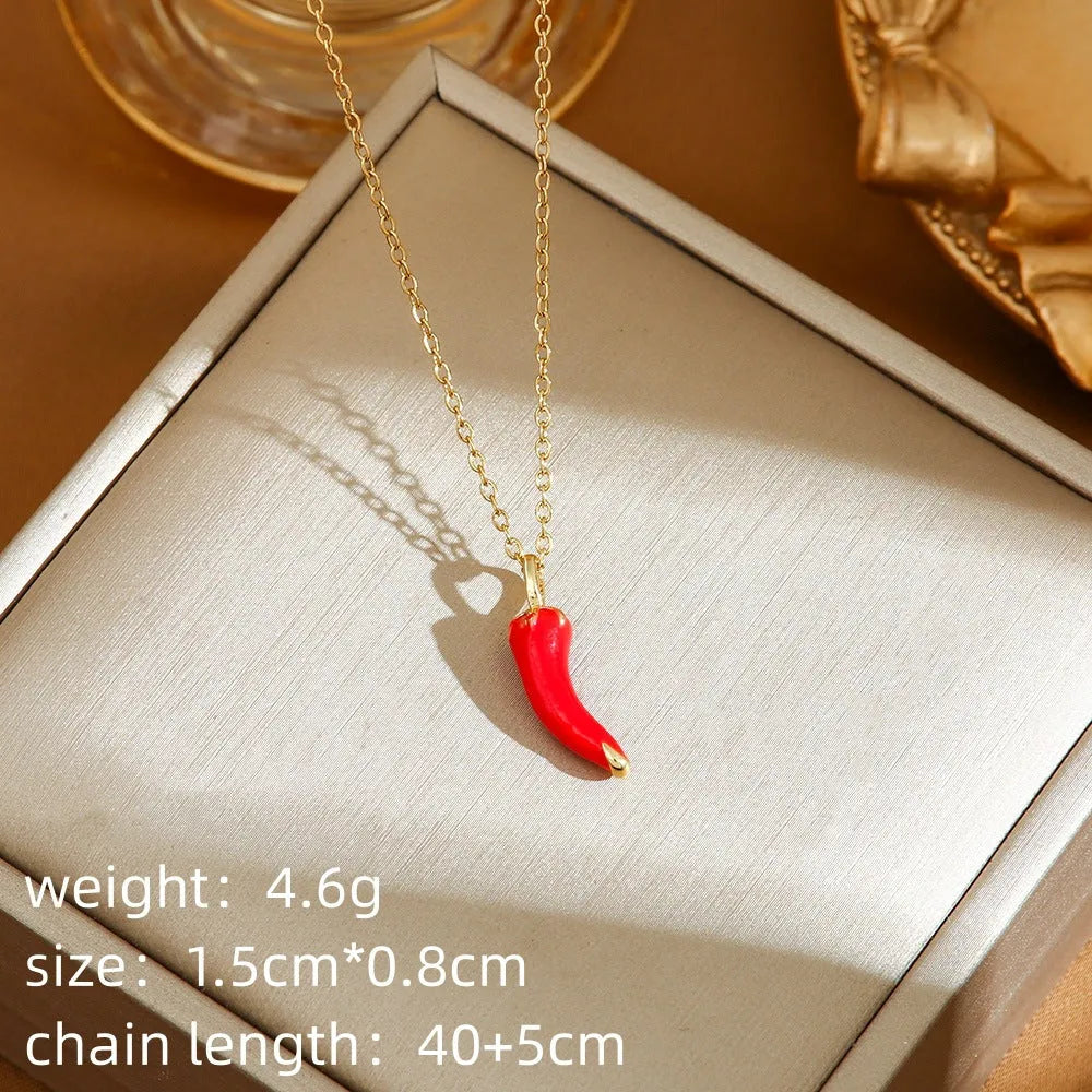 Titanium steel necklace with a delicate cherry charm on an O-ring chain.
