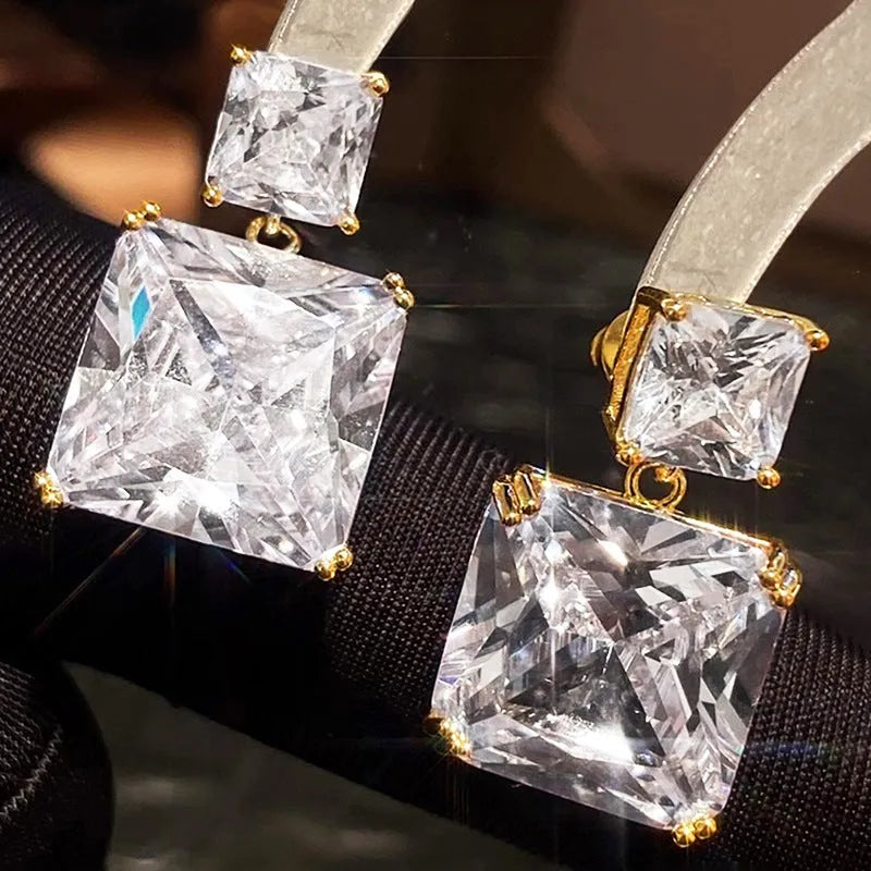 Geometric square design copper earrings with quadrilateral elements in metallic finishes