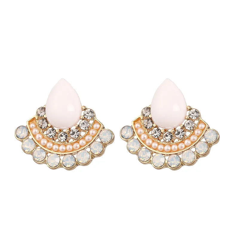 Women's retro fan-shaped silver stud earrings with rhinestones on a geometric alloy design.