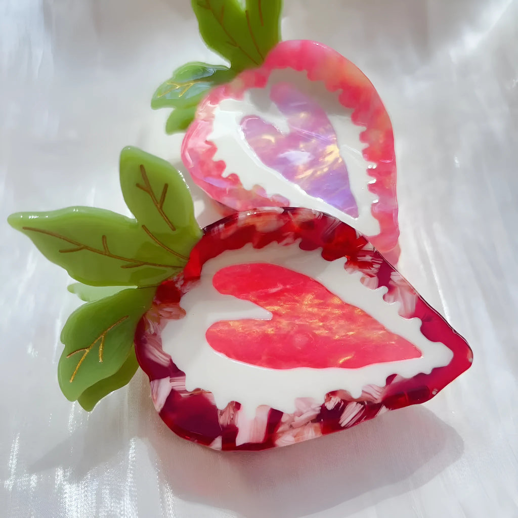 Handcrafted strawberry hairpin in pastoral style showing red and pink colour options