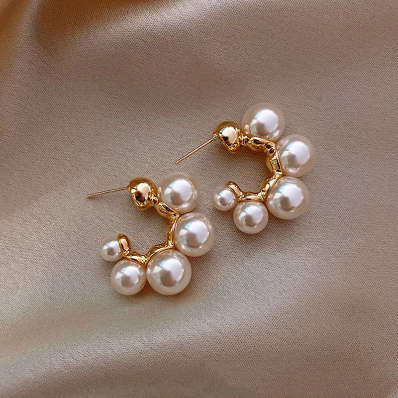 Women's red bell-shaped alloy earrings with drop pendant design