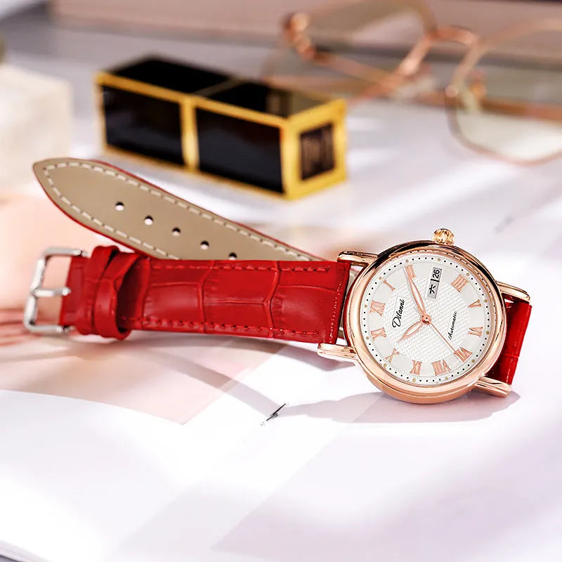 Women's automatic mechanical watch with leather and steel strap options on a white dial.