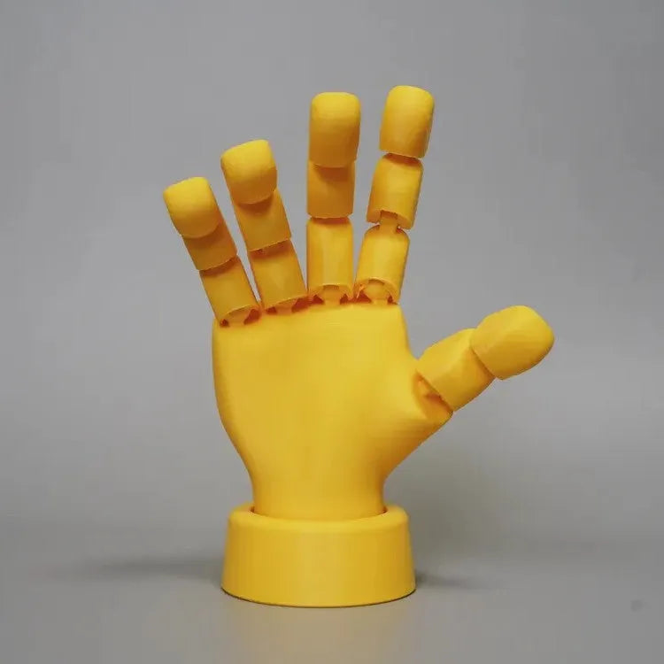 Yellow movable joint hand ornament prop for model figurines.